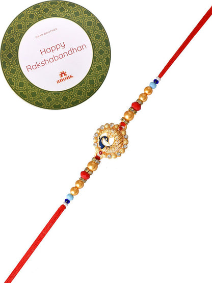 Anouk Gold Toned Beaded Peacock Patterned Rakhi With Roli Chawal & Greeting Card