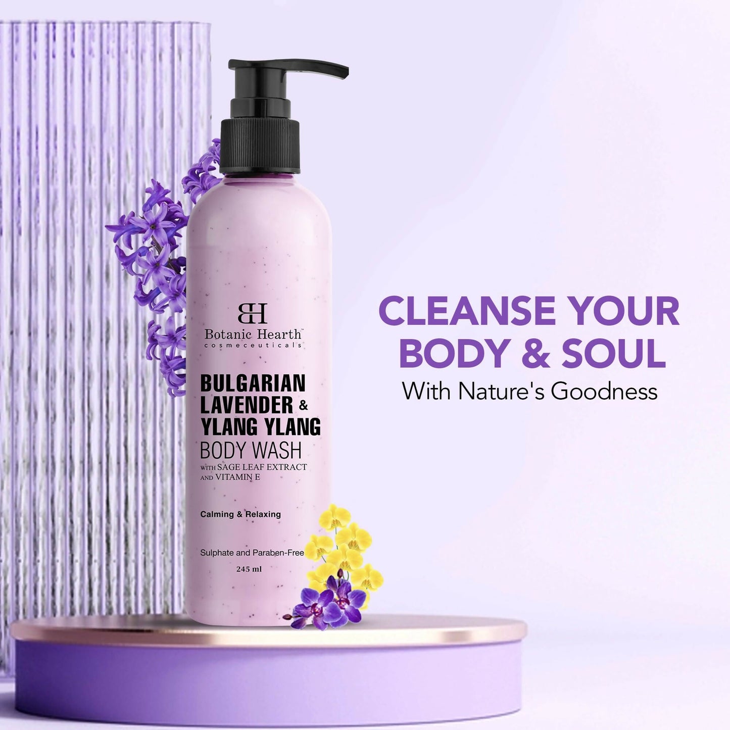 Botanic Hearth Bulgarian Lavender and Ylang Ylang body wash with Vitamin E and sage leaf extracts, shown in a clear bottle with lavender flowers