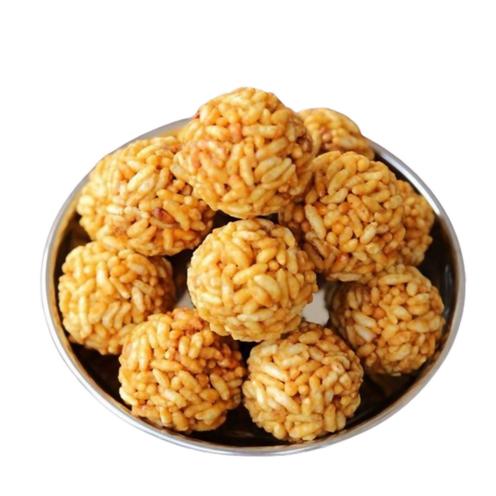 Godavari Vantillu Murmura Laddu, North Indian sweet made with puffed rice and jaggery, showcasing golden-brown textured laddus.