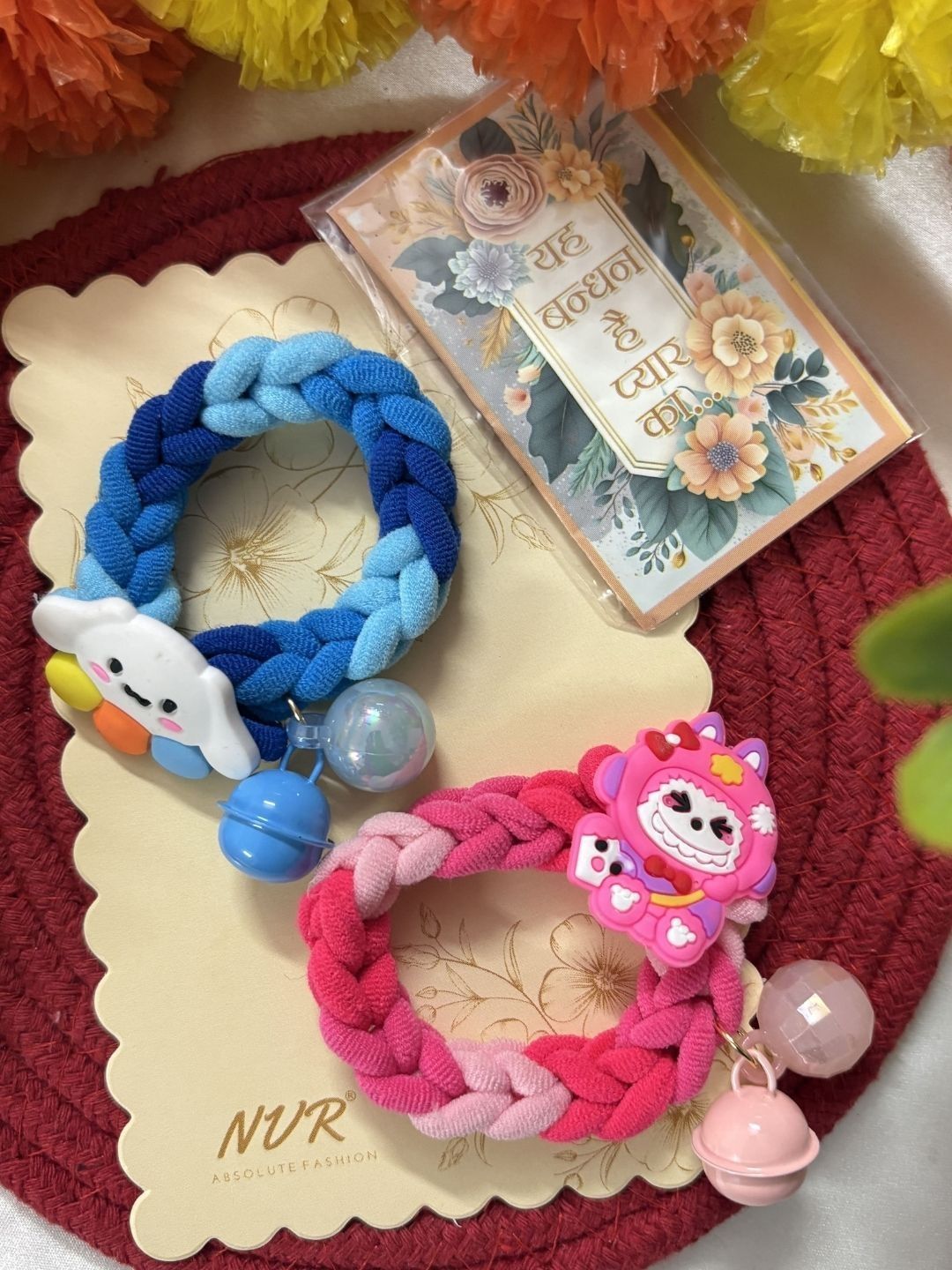Anouk Set Of 2 Blue & Pink Kids Rakhi With Roli Chawal Chandan Mishri