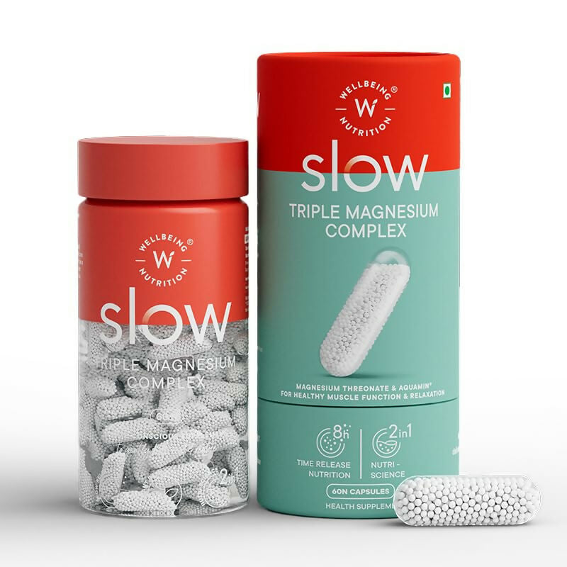 Wellbeing Nutrition Slow Triple Magnesium Complex Ayurvedic capsules in a glass bottle with label showing capsules inside.