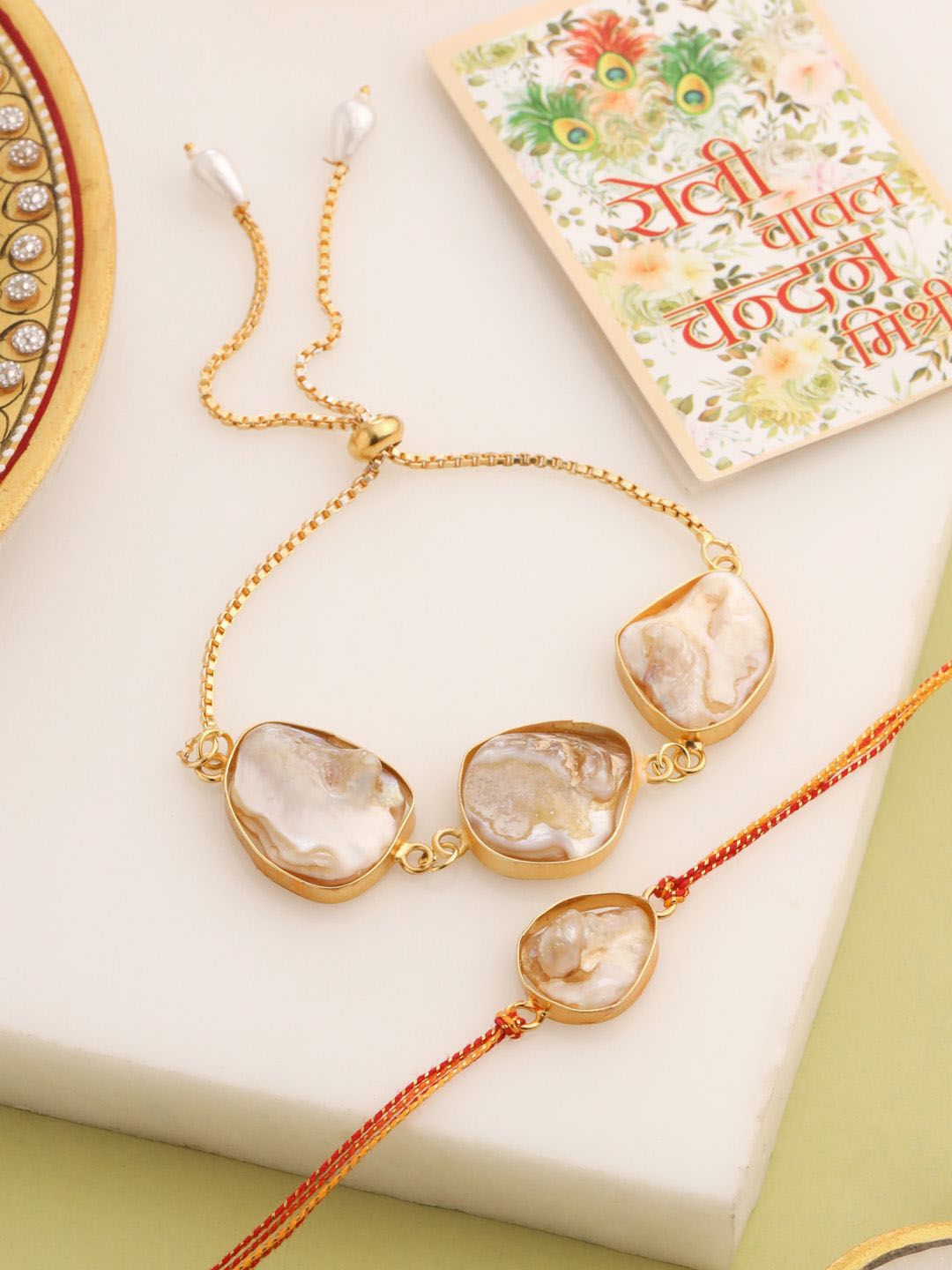 Anouk Set Of 2 Gold Toned Pearls Bhaiya Bhabhi Rakhi With Roli Chawal Chandan Mishri