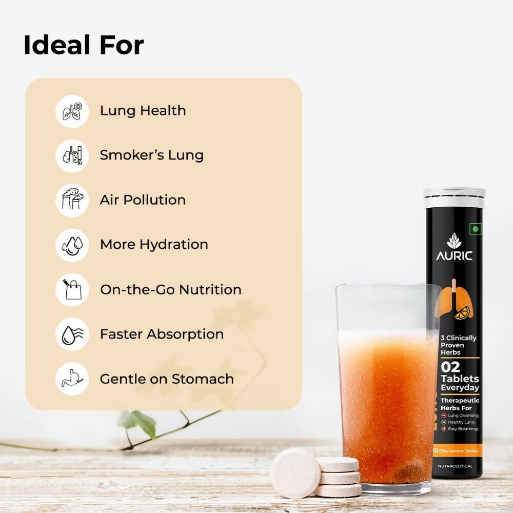 Auric Lung Detox Effervescent Ayurvedic Tablets dissolved in glass, showcasing natural ingredients and vibrant effervescent bubbles.