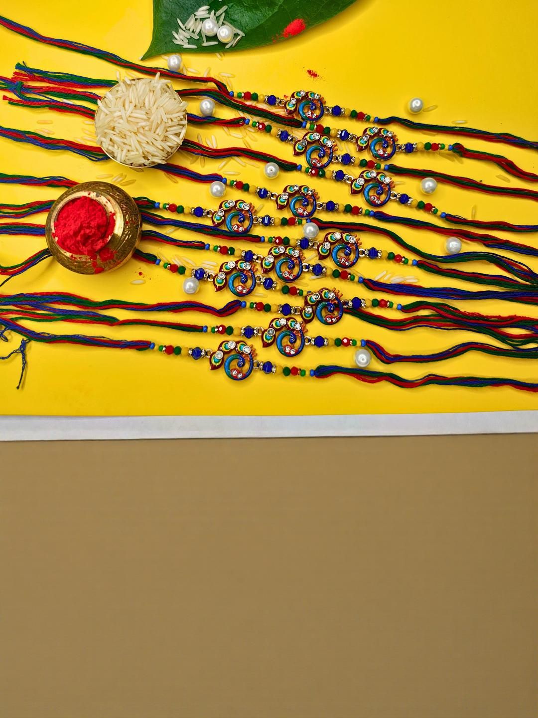 Anouk Set Of 12 Beaded Cotton Thread with AD Stones & Meenakari Designer Rakhi for Brother