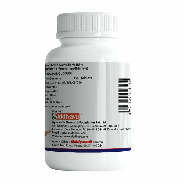 Baidyanath Medohar Guggulu Ayurvedic tablets in a white bottle with label, used for wellness and natural health support.