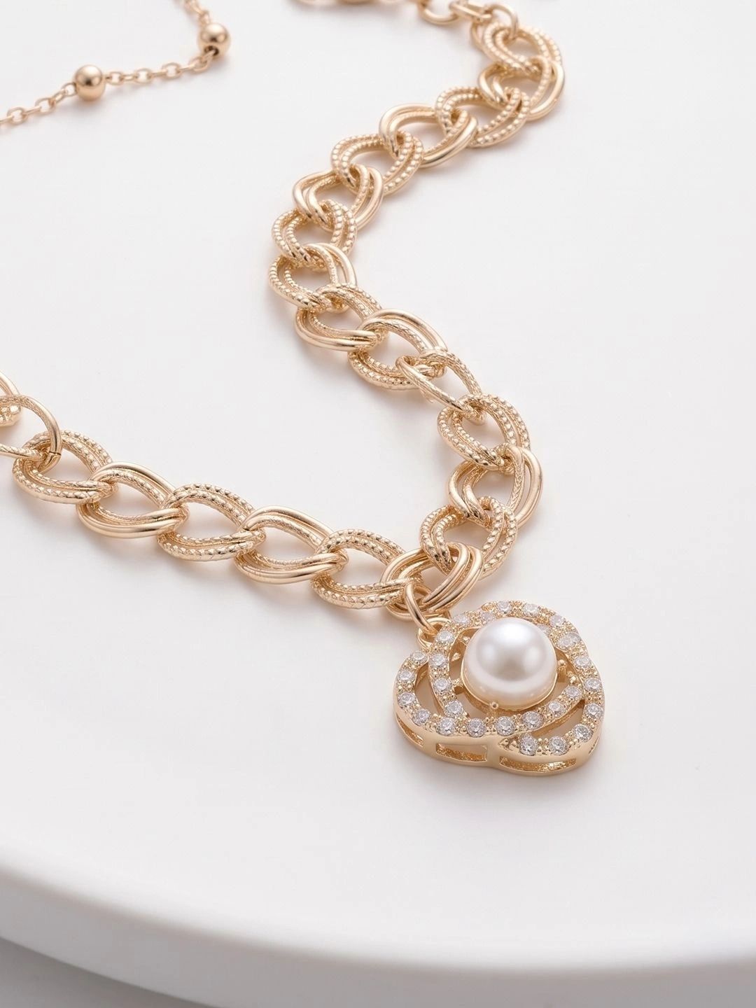 Anouk Women Gold Plated Ad Bracelet Rakhi With Roli Chawal Chandan Mishri