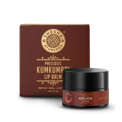 Shesha Ayurveda Kumkumadi Brightening Lip Balm tube showcasing natural ingredients and sleek packaging.