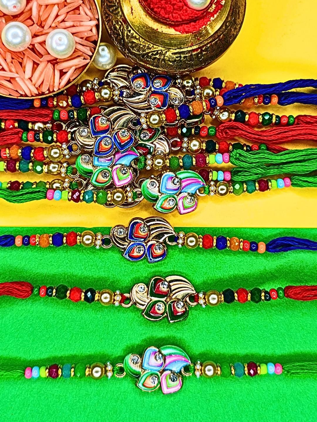 Anouk Set Of 12 Beaded Cotton Thread with AD Stones & Meenakari Designer Rakhi for Brother