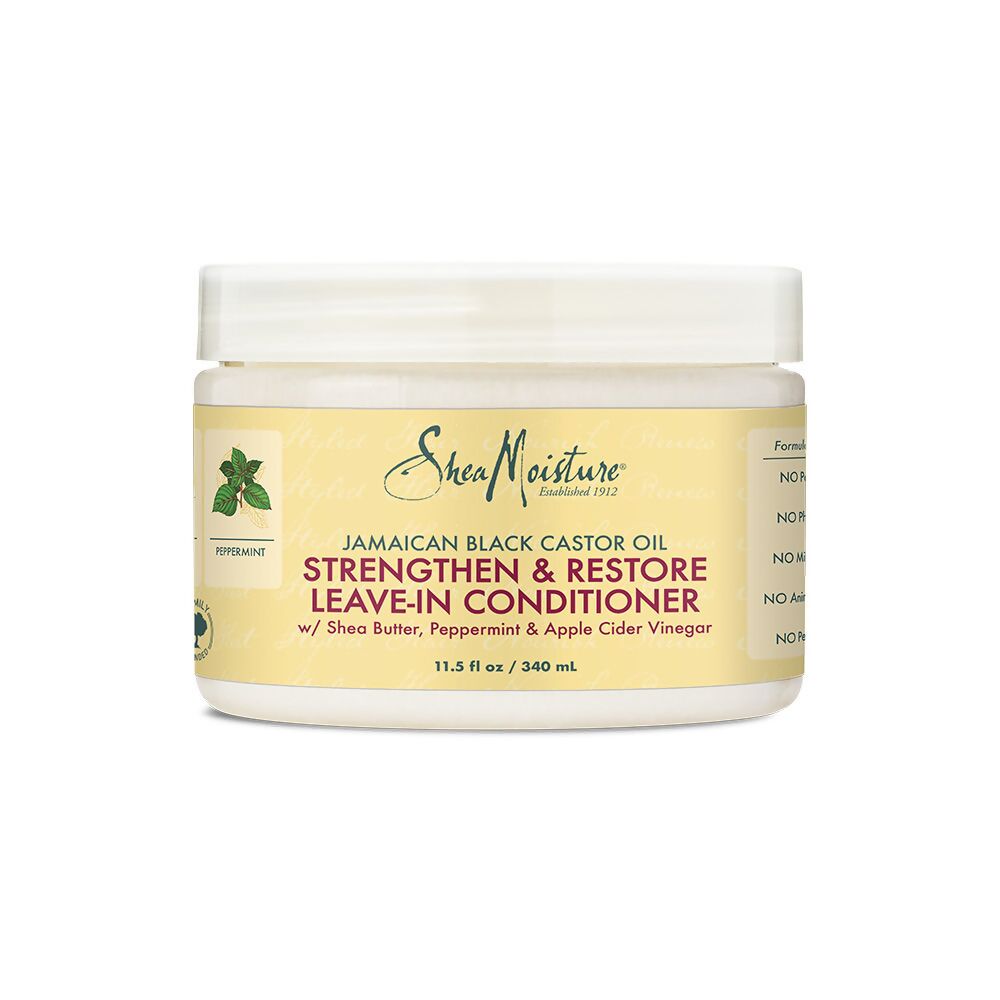 Shea Moisture Strengthen & Restore Leave-In Conditioner bottle with pump dispenser on a white background.