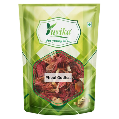 Yuvika Jaswand Hibiscus flower in a vibrant bloom, used in Ayurvedic products, with bright red petals and green leaves.