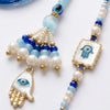 Dhiyona Set Of 2 Evil Eye Hand Design Bhaiya Bhabhi Rakhi With Roli Chawal Chandan Mishri