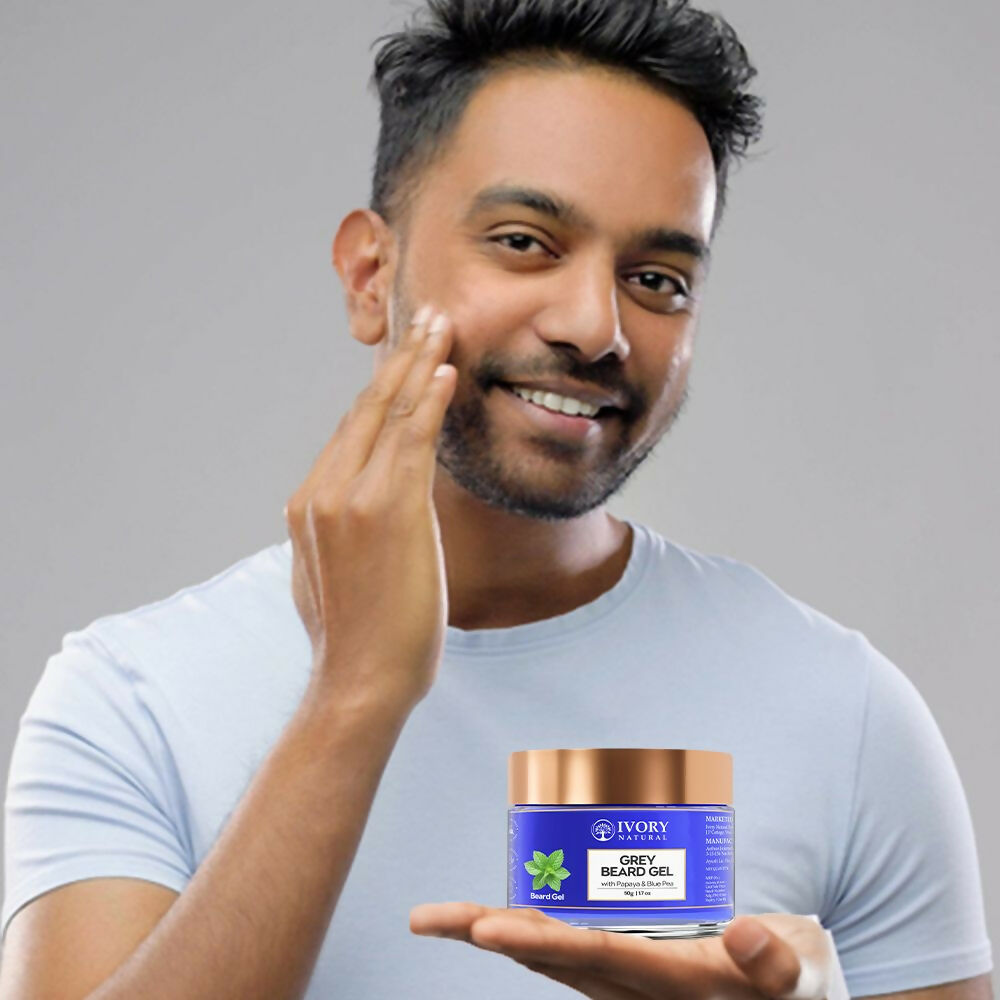 Ivory Natural beard gel with natural grey tone, providing shine and vibrancy to dark beards, in a clear bottle with a pump dispenser.