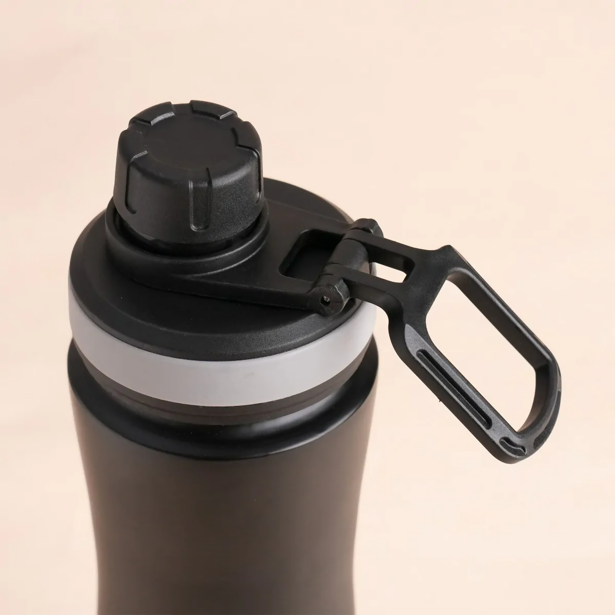 Isha Life 700ml copper water bottle with a sleek design and stainless steel cap, ideal for staying hydrated on the go