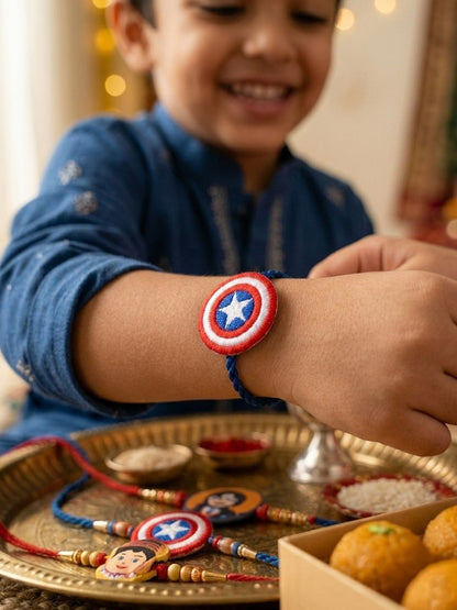 Anouk Stylish Red & Blue Avengers Design Kids Rakhi With Roli Chawal Chandan Mishri