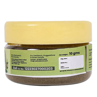 Nuskha Peepal Pepper Powder in a glass jar, showing fine, reddish-brown ground pepper spice from the Nuskha brand.