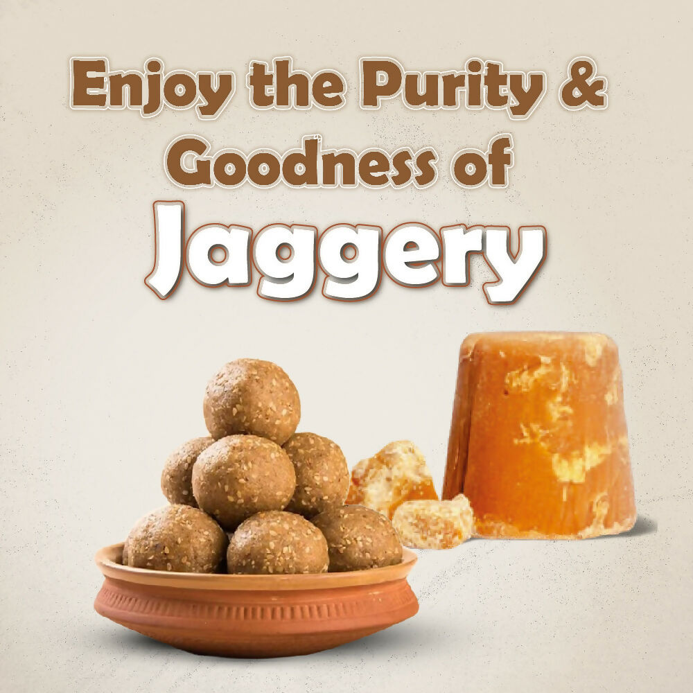 Naivedyam chemical-free jaggery cubes showing golden brown, textured surface in a natural setting.