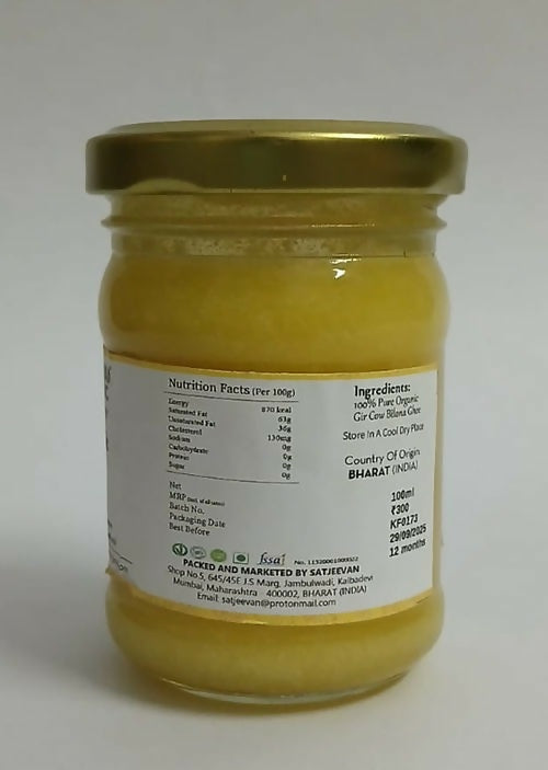 Organic Satjeevan Vedic Gir Cow Bilona Ghee jar with golden-yellow ghee inside, showcasing traditional cow ghee quality.
