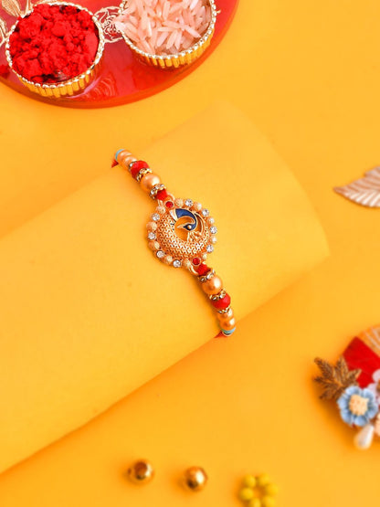 Anouk Gold Toned Beaded Peacock Patterned Rakhi With Roli Chawal & Greeting Card