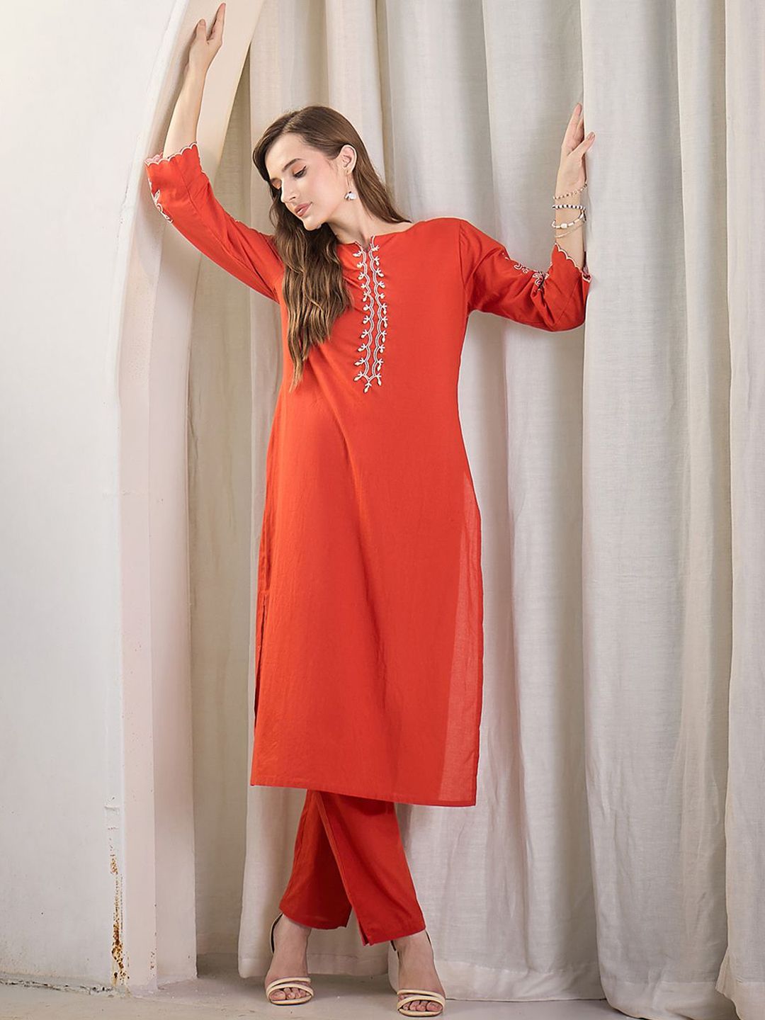Women Ethnic Motifs Embroidered Cotton Kurta with Trousers