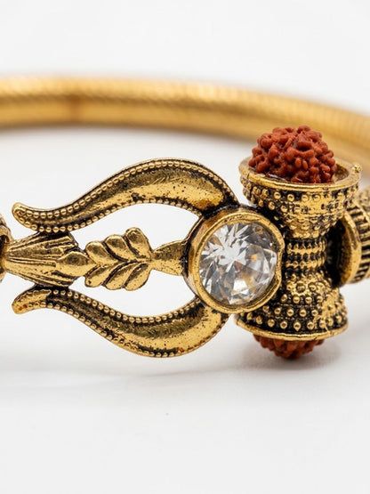 Anouk Gold Plated Trishool Design Rudraksh Rakhi Bracelet With Roli Chawal Chandan Mishri