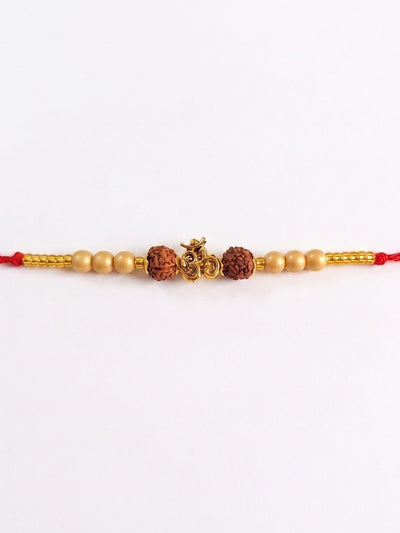 Indyancart Om Design Rudraksh Thread Rakhi With Roli Chawal Chandan Mishri
