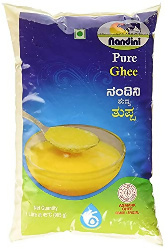 Nandini Pure Cow Ghee in a glass jar, showcasing its creamy texture and golden color, ideal for cooking and medicinal use.