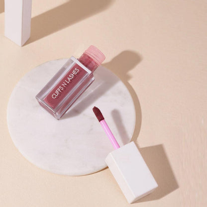 CUFFS N LASHES Matte Liquid Lipstick in shade 04 Duggs, featuring the product tube with a matte finish and sleek packaging.