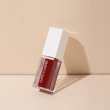 CUFFS N LASHES Matte Liquid Lipstick in shade 08 2015, showing the sleek tube and applicator with the lipstick inside.