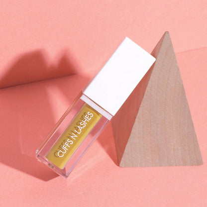 CUFFS N LASHES Matte Liquid Lipstick in 15 Date With Sun, featuring a sleek tube and applicator for bold, matte lips.