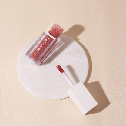 CUFFS N LASHES Matte Liquid Lipstick in 16 November shade, featuring a sleek tube with the product visible.
