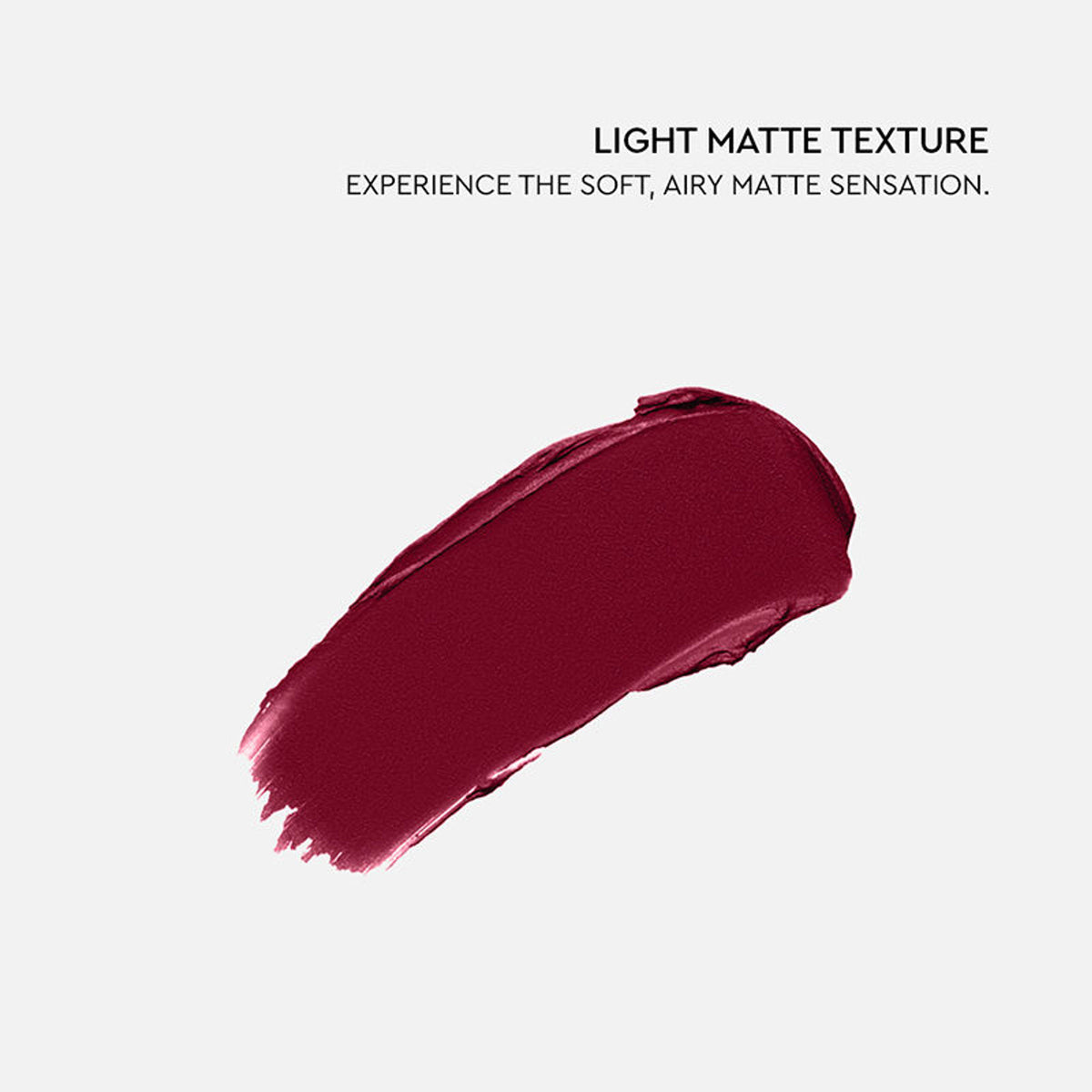 KIRO Non-Stop Airy Matte Liquid Lipstick in Velvet Merlot, featuring a smooth, velvety deep red lip color on a model.