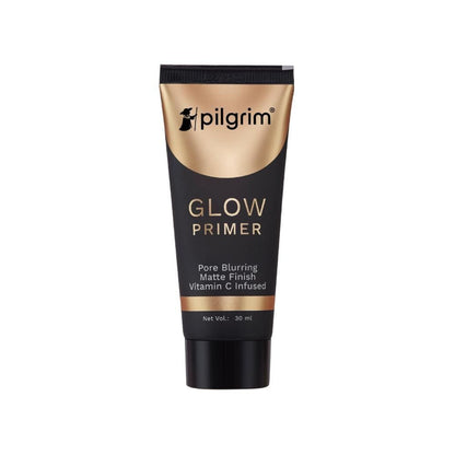 Pilgrim Instant Glow Primer with gold shimmer, smooth texture and radiant finish, shown in a close-up image.