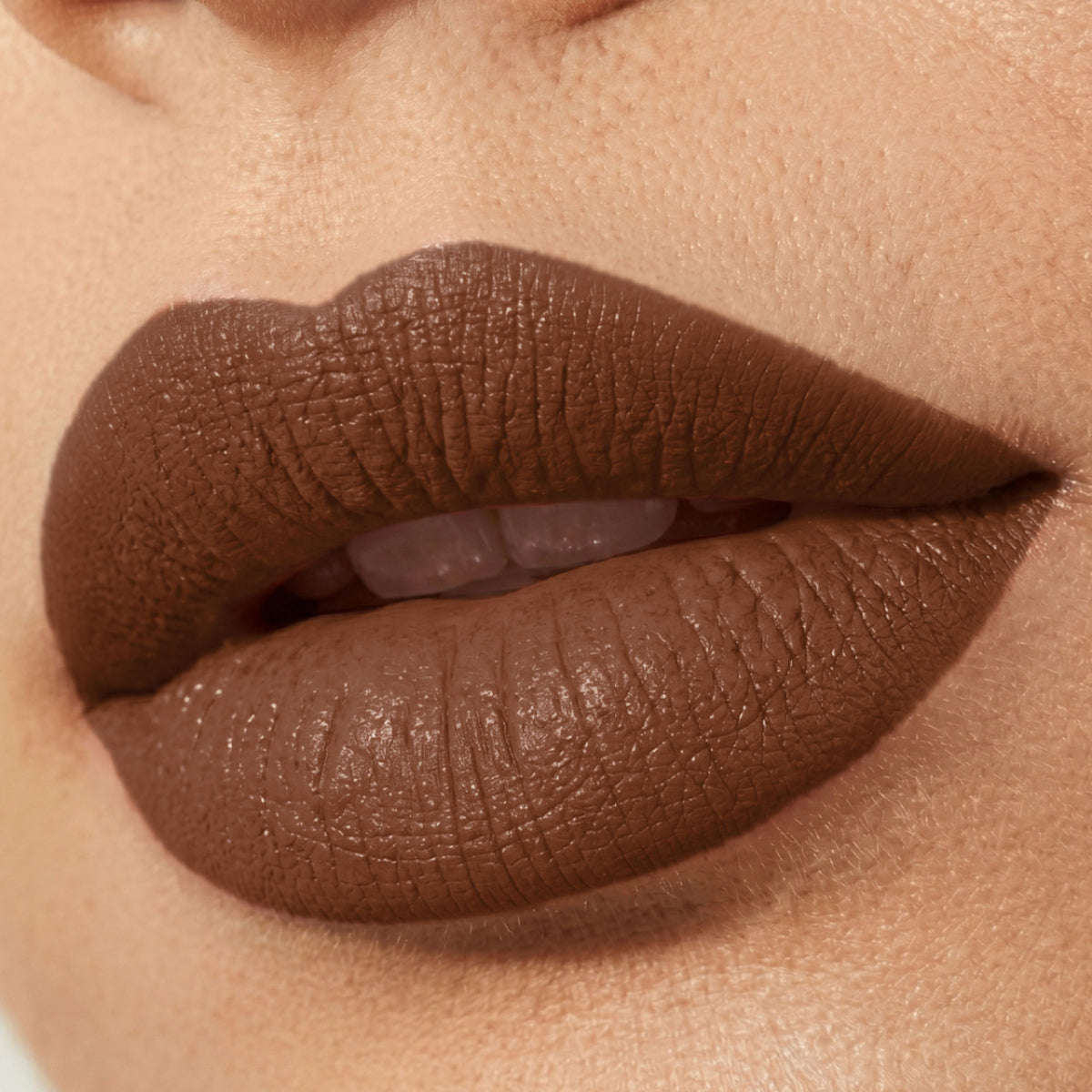 Flicka Bullet Lipstick in shade 17 with rich matte finish, lightweight formula, intense pigment, and sleek packaging.