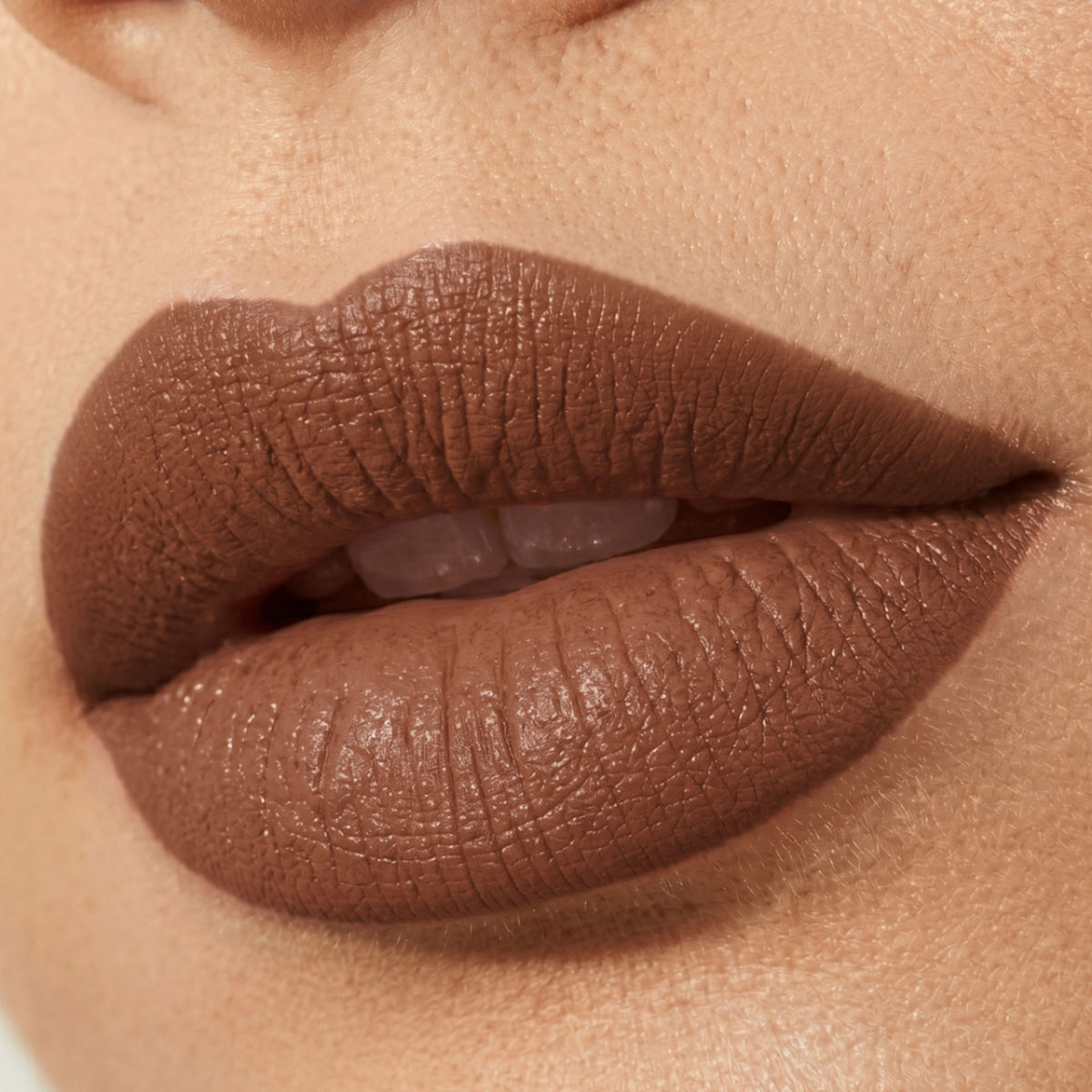 Flicka Bullet Lipstick in shade 19 with rich matte finish, lightweight formula, intense pigment, and sleek packaging.