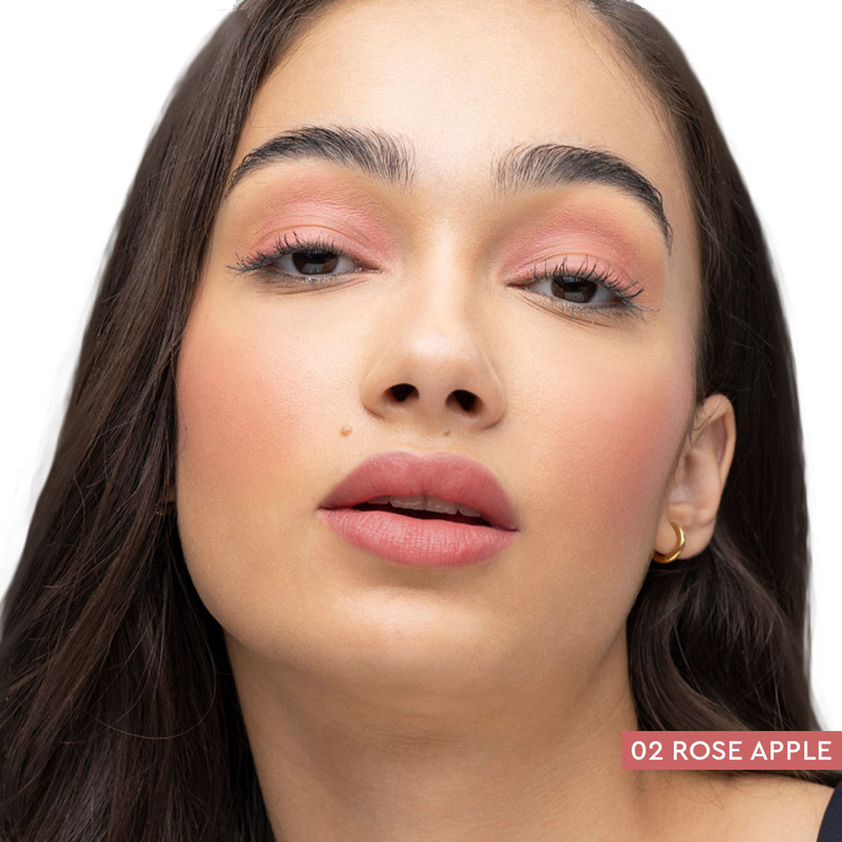 KIRO Afterglow Lip & Cheek Tint in Rose Apple, featuring a sleek tube with the tinted product visible inside.