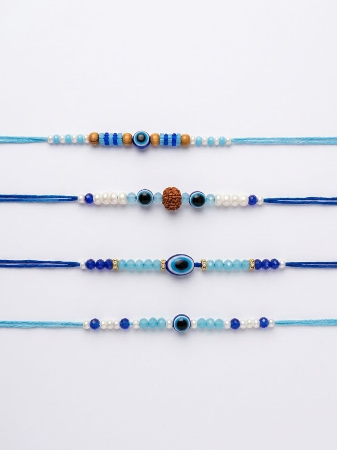 Anouk Set Of 4 Blue Evil Eye Thread Rakhi With Roli Chawal Chandan Mishri