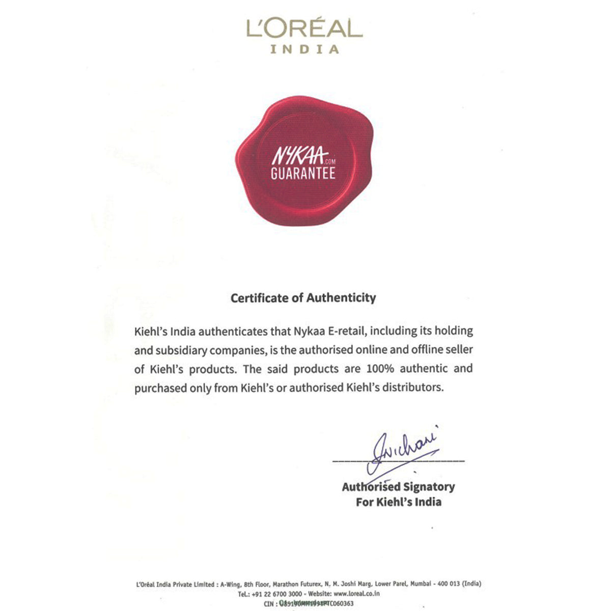 Kiehl's Age Defender Power Serum for Men, anti-aging facial treatment in a sleek bottle with a pump dispenser.