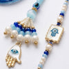 Dhiyona Set Of 2 Evil Eye Hand Design Bhaiya Bhabhi Rakhi With Roli Chawal Chandan Mishri