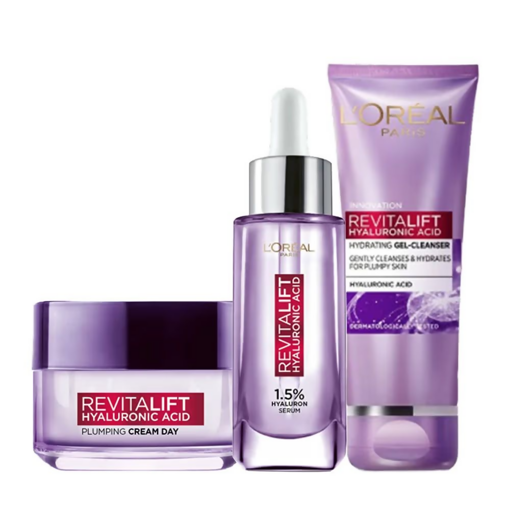 L'Oreal Paris Hydrated, plump and radiant skin kit featuring serums and essence with skincare bottles and applicators.