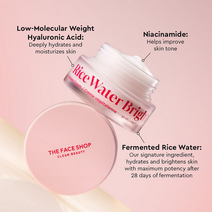 The Face Shop Rice Water Cream with Niacinamide and Hyaluronic Acid, a face cream in a white jar with a pink lid.