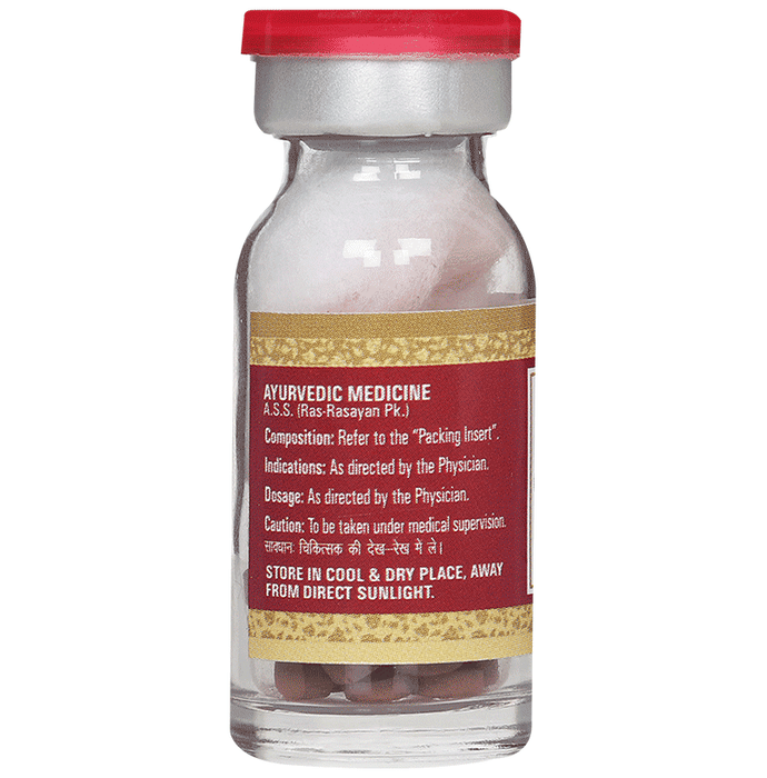 Multani Brihat Vat Chintamani Ras Ayurvedic tablets with gold, shown in a bottle with tablets inside.