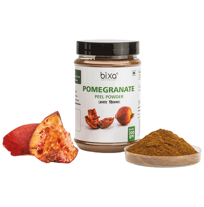 Bixa Botanical Pomegranate Peel Powder in a clear jar, Ayurvedic powder for skincare and health benefits.