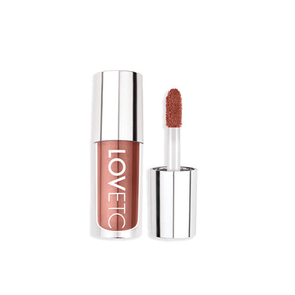 LOVETC High Glaze Tinted Lip Gloss in Peach Of Mind with mirror shine, non-sticky formula and hyaluronic acid for smooth lips.