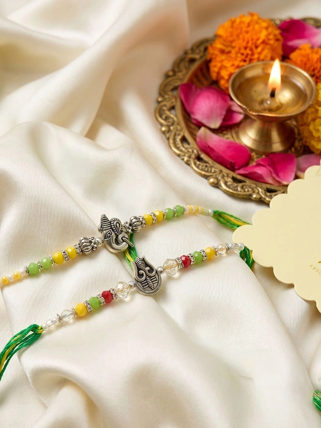 Anouk Set Of 2 Multicolor Religious Thread Rakhi With Roli Chawal Chandan Mishri