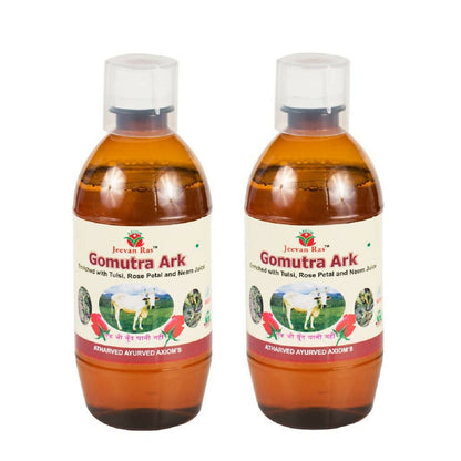 Axiom Goumotra Ark Ayurvedic drink in a glass bottle with a label, showcasing traditional herbal ingredients and natural packaging.