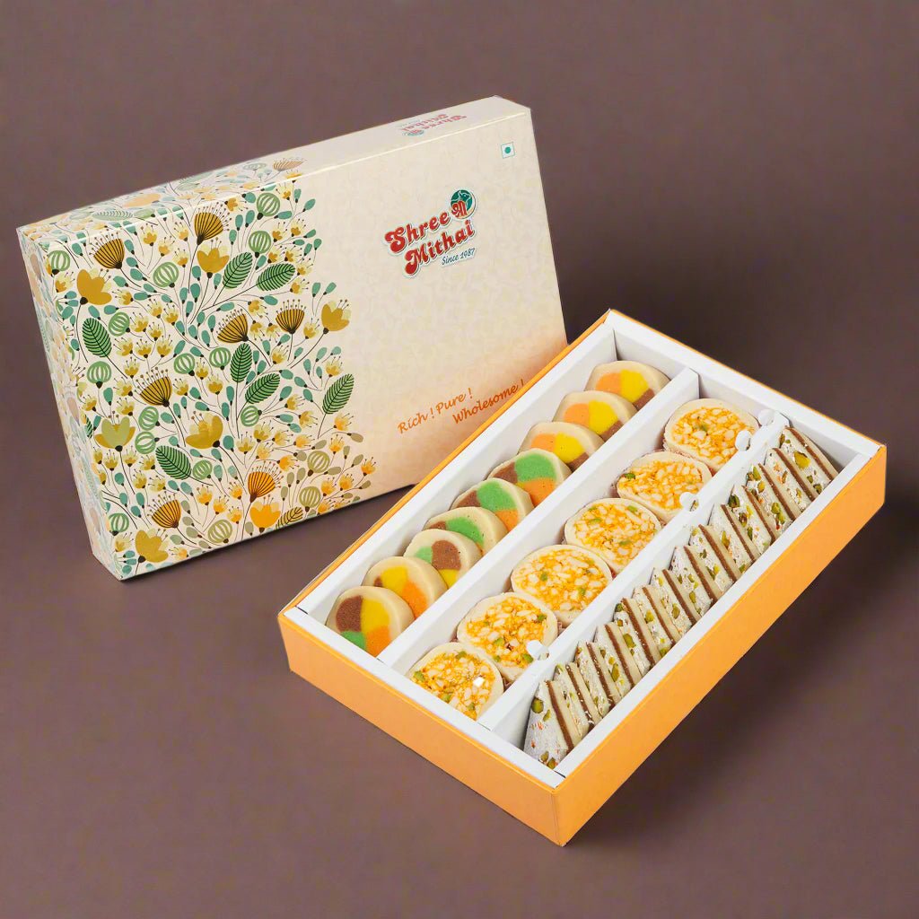 Assorted Shree Mithai Kaju Utsav North Indian sweets in decorative boxes, featuring kaju-based Indian confections.