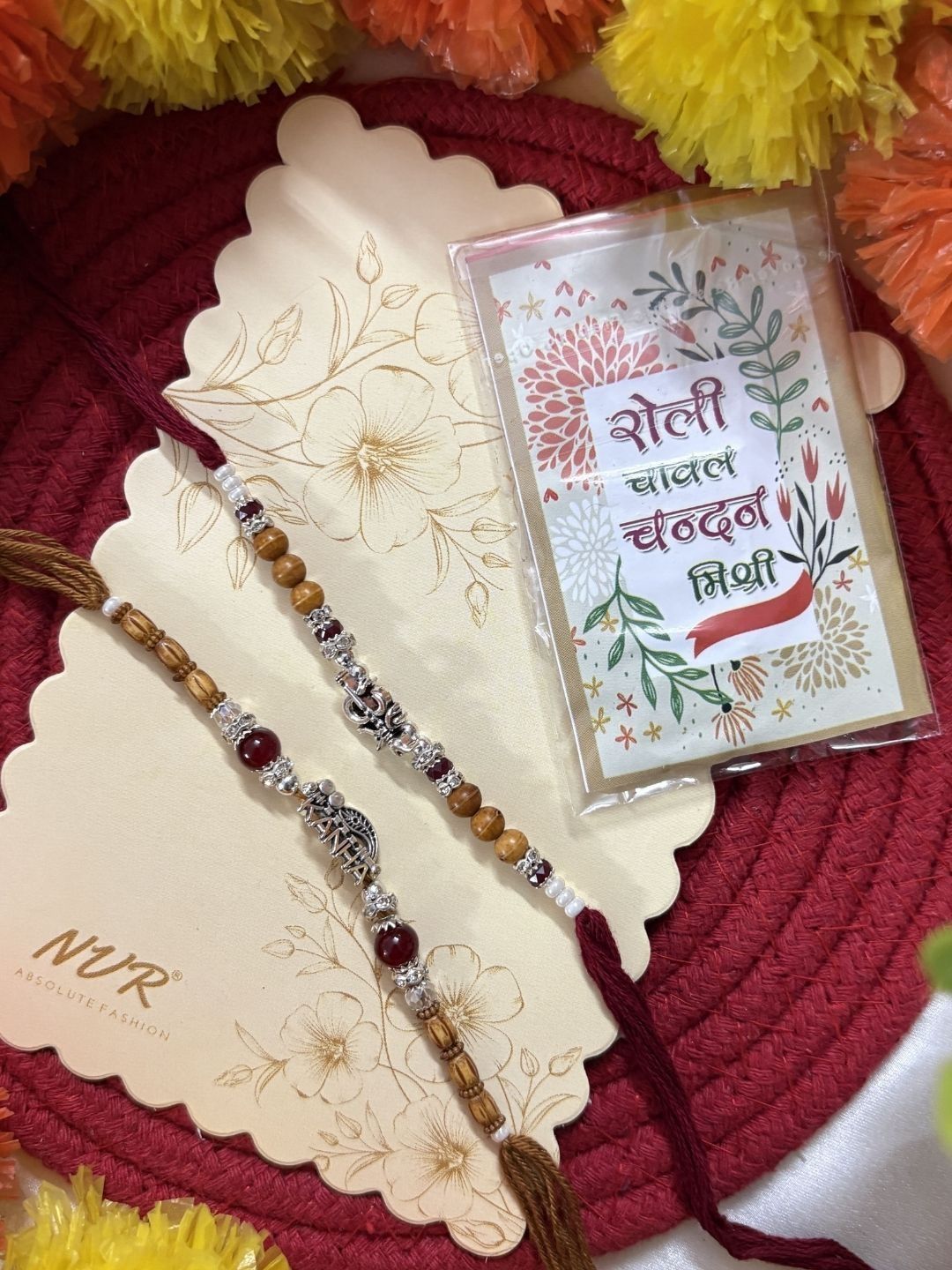 Anouk Set Of 2 Silver Toned Religious Rakhi Thread Rakhi Roli Chawal Chandan Mishri
