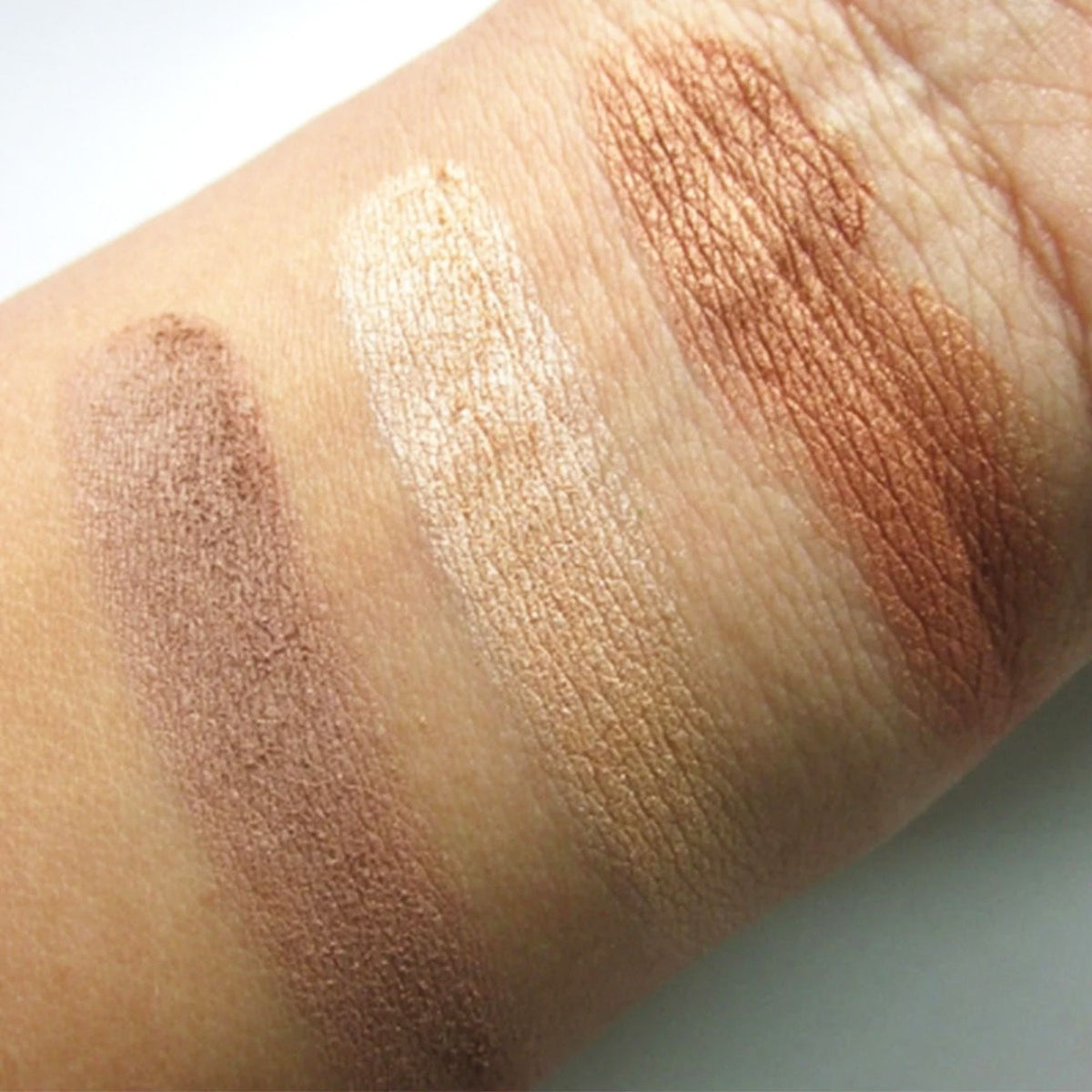 Makeup Revolution Ultra Sculpt & Contour Kit in Ultra Light-Medium C04 with contour powders and highlighters arranged in a palette.