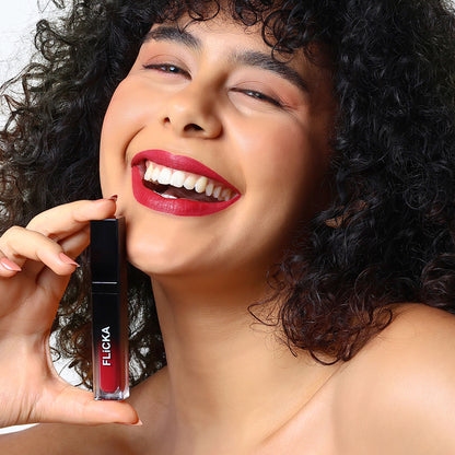 FLiCKA Flicka Attack Liquid Lipstick in Vintage Wine showing the dark red, smudge-proof, waterproof lipstick tube on a neutral background.