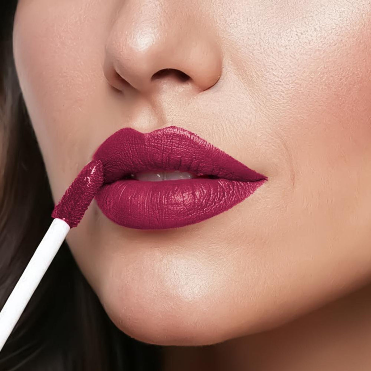 FLiCKA Flicka Weightless Impressions Liquid Lipstick in a light, smudge-proof long-lasting formula, shown in a sleek tube.
